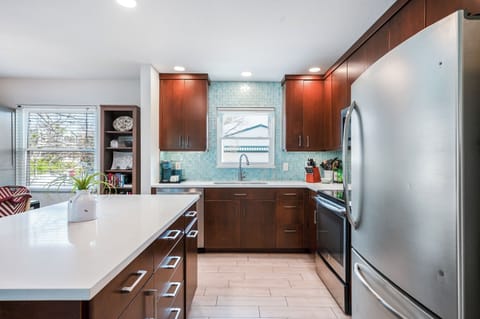 Updated kitchen with quartz counters and stainless appliances