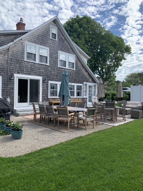 Outdoor seating/entertainment area for main house.