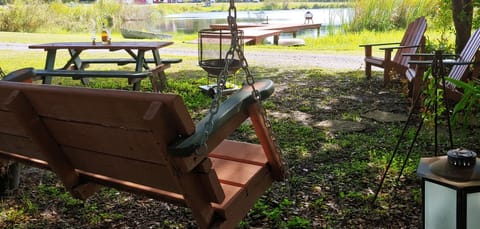 A peaceful view for a picnic by the pond