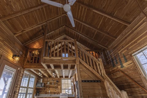 The 18ft ceiling gives the log cabin a very open & spacious feeling.