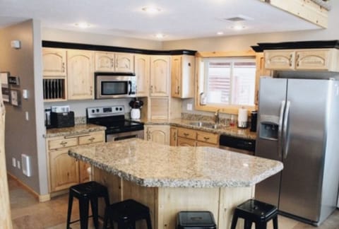 Kitchen is fully stocked with everything you need to make delicious meals.