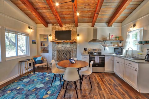 Dining table and view of kitchen.