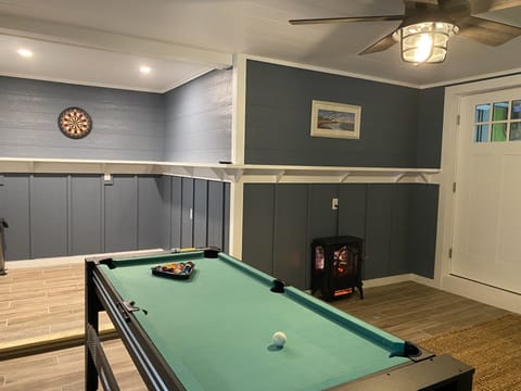 Game room-Game table (pool/air hockey/pingpong), darts, corn hole, board games..