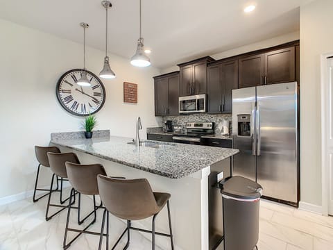 Kitchen with Island and 4 Bar Stools