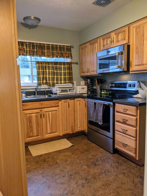 A kitchen where you have pretty much everything you need to cook or bake.