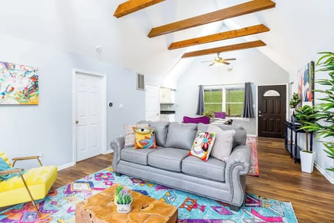 Take a look at the living room showing the balance of both basic and eye-popping colors.