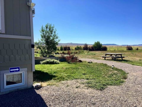 Parking area/path to stairs leading to basement entrance