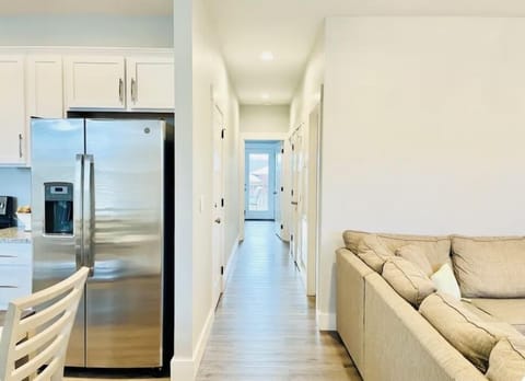 Down the hallway is the stairs to the lower level, Bath #2, laundry, 
BR 1 and 2