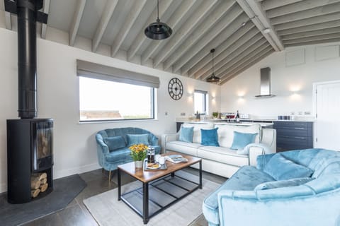 Dorset Eco Retreats, Ansty: Fern with its wood burning stove and comfortable seating