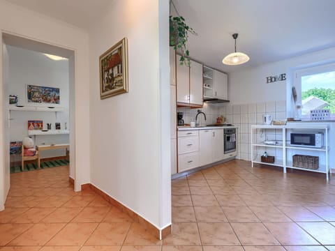 Flooring, Floor, Interior Design, Furniture, Wood, Ceiling, Room, Lighting, Kitchen, Major Appliance