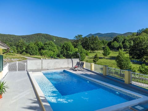 Water, Plant, Property, Swimming Pool, Sky, Building, Azure, Tree, Rectangle, Mountain