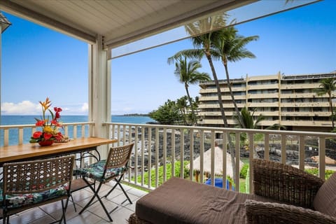 Relax on your private lanai overlooking the lagoon, gardens, ocean waves, and the distant lighthouse.