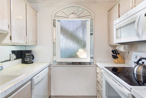 Well-equipped kitchen updated with tasteful finishes, perfect for preparing meals at home.
