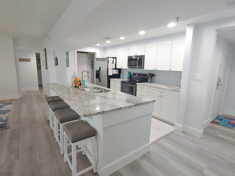 Full Kitchen with regular coffee pot and Keurig! 
Breakfast Bar Seating for 4