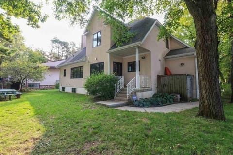 Backyard with picnic table, gas grill, fire pit (starter firewood provided).
