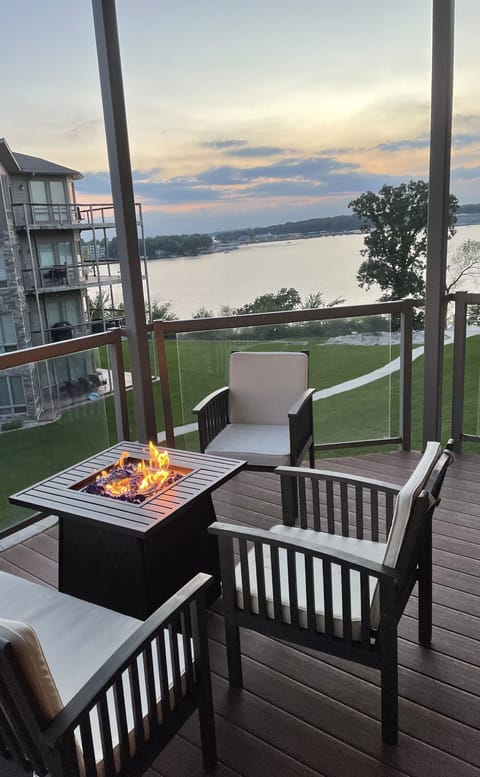 Enjoy a gorgeous lake view while seated comfortably around the fire table.