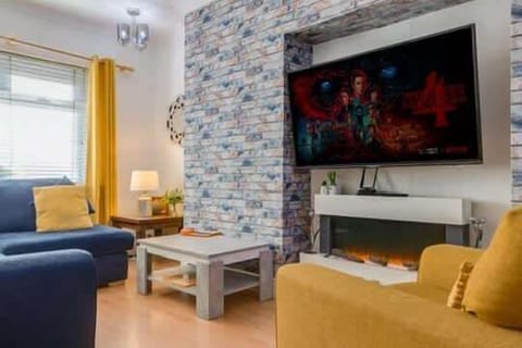 A well appointed, cozy living room for everyone to gather.