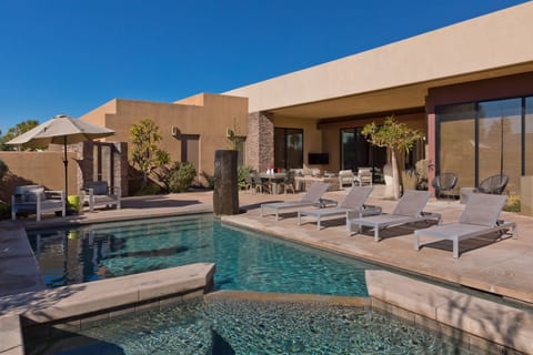 Complete privacy with saltwater pool and spa, outdoor dining, BBQ, and firepits.