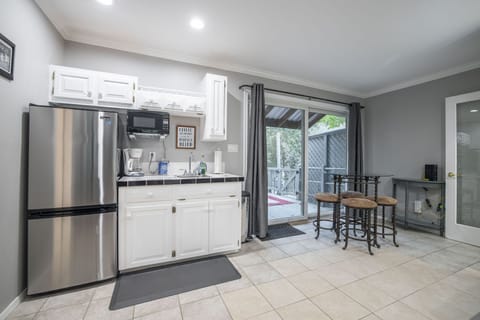 Upstairs kitchenette + deck access