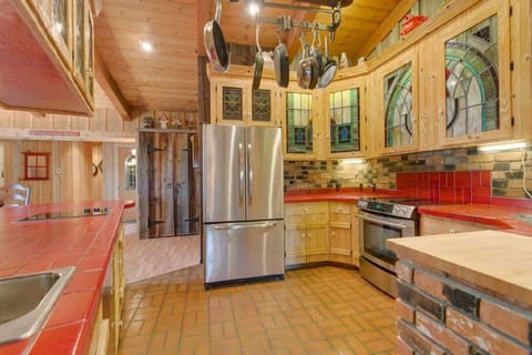 Spacious kitchen is fully stocked with large island.
