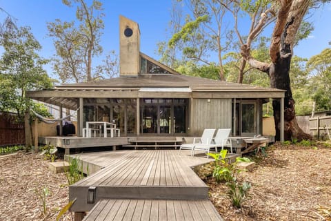 Rear view of the house and garden looking back from the jetty 