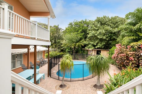 View of the pool from the walk down the stairs from the private master balcony 