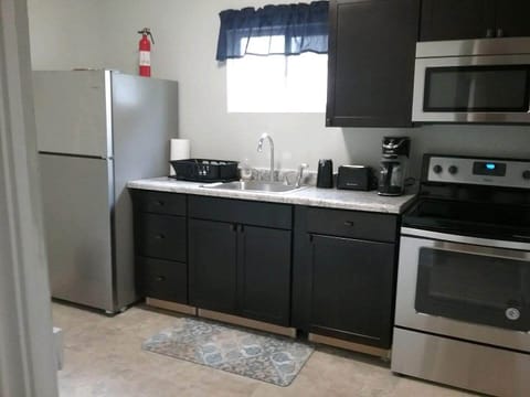 Kitchen view by basement steps