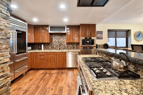 Kitchen Island with Oven and Cooktop, plus Breakfast Bar on Main Level (2nd)