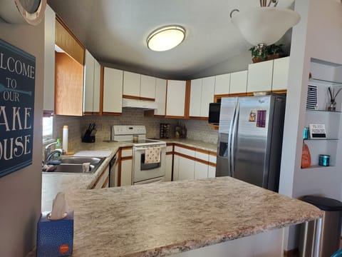 Well equipped kitchen with all of your cooking needs, 3 coffee pots, crock pot .