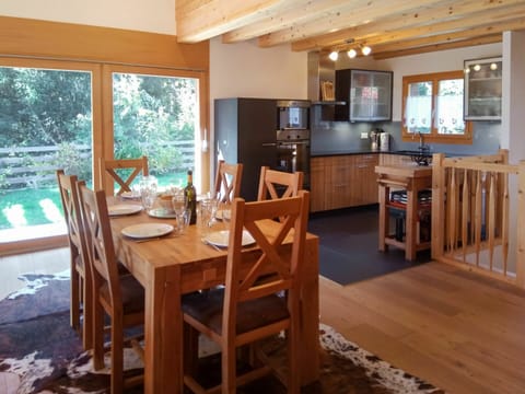 Dining Room, Room, Furniture, Wood Flooring, Property, Hardwood, Table, Building, Home, Floor