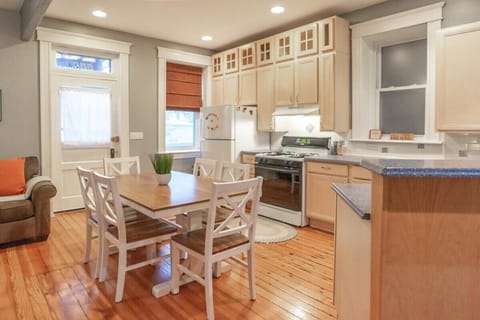 Step through into the fully equipped eat-in kitchen