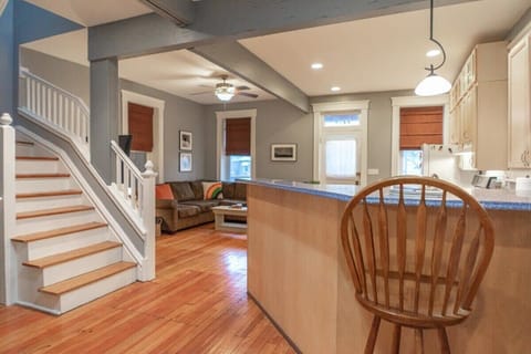 Sit up at the breakfast bar while you keep the chef company