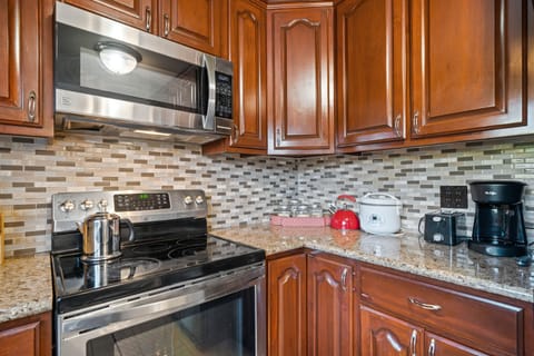 Mornings are sorted with a coveted coffee machine and stovetop kettle for tea