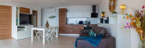 Our luxurious fully equipped studio has an extending table with wheels if you prefer to eat dinner inside instead of on your terrace.