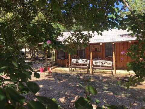 Entry patio, which now has extra chairs and a wooden swing - see next photo.