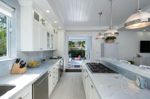 Gas Range, Wine Fridge, Ice Maker
Direct Access to the Pool