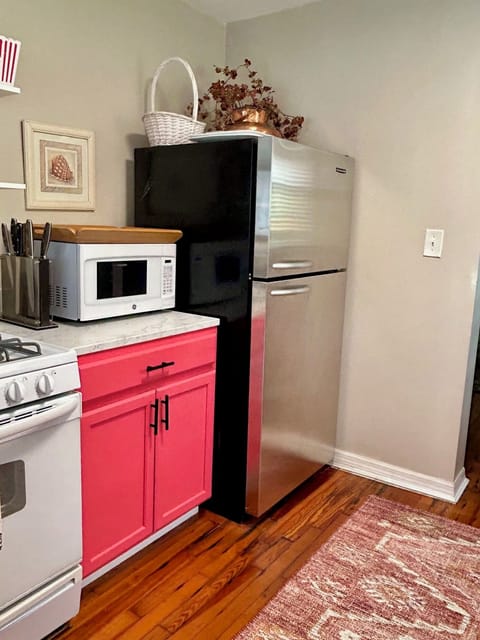 Kitchen with full-sized refrigerator