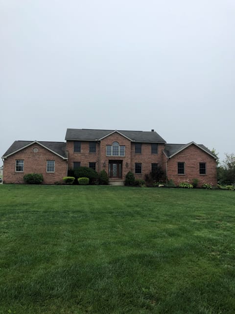 300 foot of front yard sloping down.