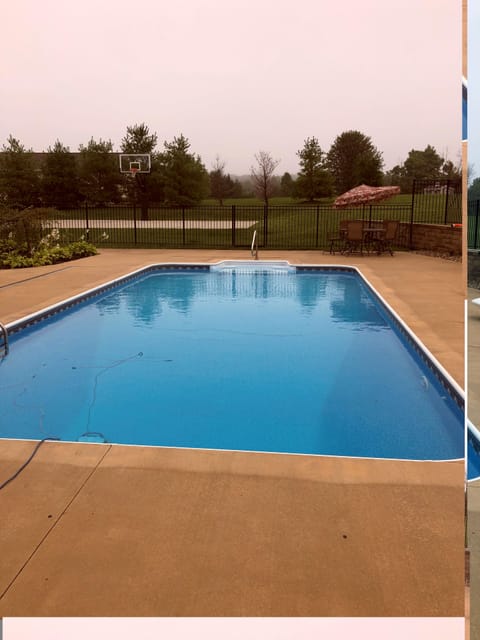 Looking from pool house across the pool at the 3-point line basketball court