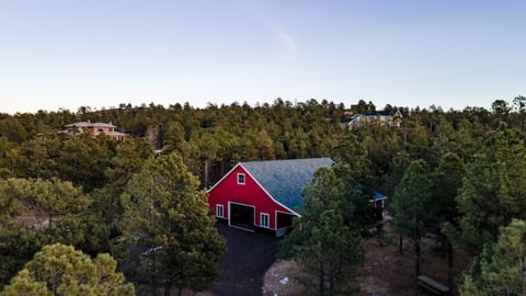 The barn cannot be seen from the primary residence, featured in the background