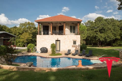 16 gated acres, with saltwater pool, hot tub, grill and tesla charging.