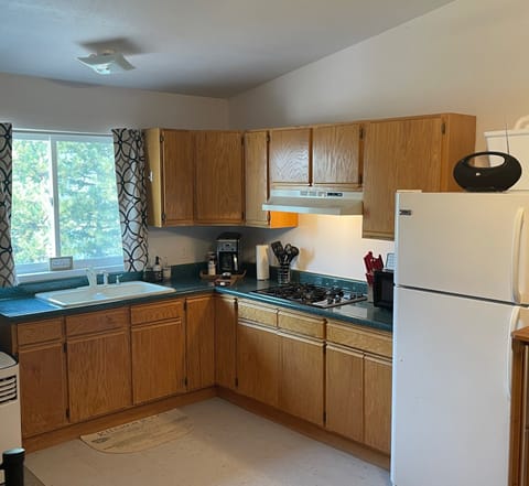 Nice kitchen equipped with Full Sized refrigerator!