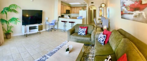 Very clean and spacious living room with a queen sofa bed