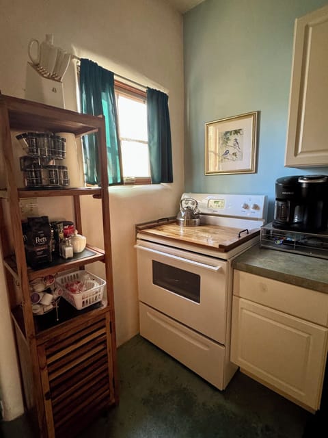 We supply tea and coffee for our guests. Snacks and bottled waters also. 