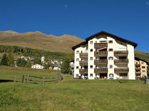 Sky, Building, Window, Plant, Mountain, Natural Landscape, Land Lot, Tree, Grass, Landscape