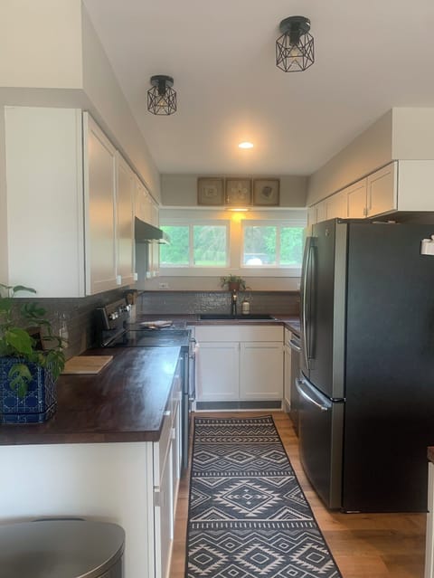 Kitchen with recently updated appliances. 
