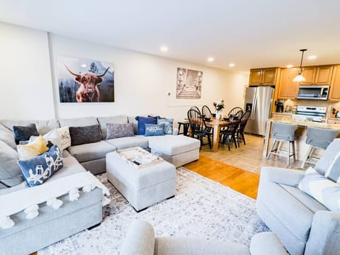 The open design living area allows you to cook while still enjoying the fireplace and family fun!