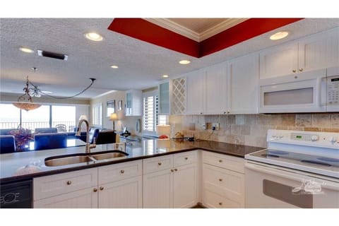 Open kitchen format with granite countertops