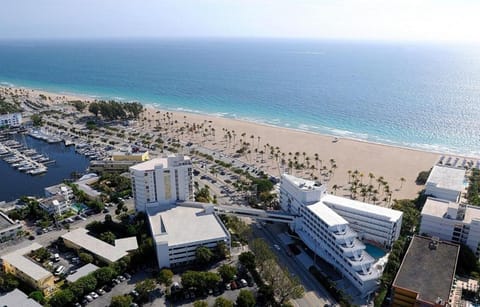 Take in aerial views of beach, marina, and resort grounds.