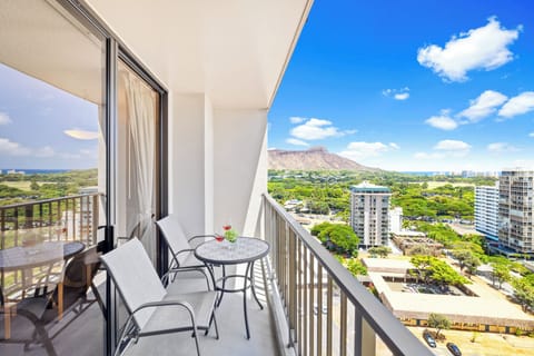 Start your day with a perfect cup of coffee while seated in these comfortable chairs — all while enjoying thew breathtaking city view from the balcony.